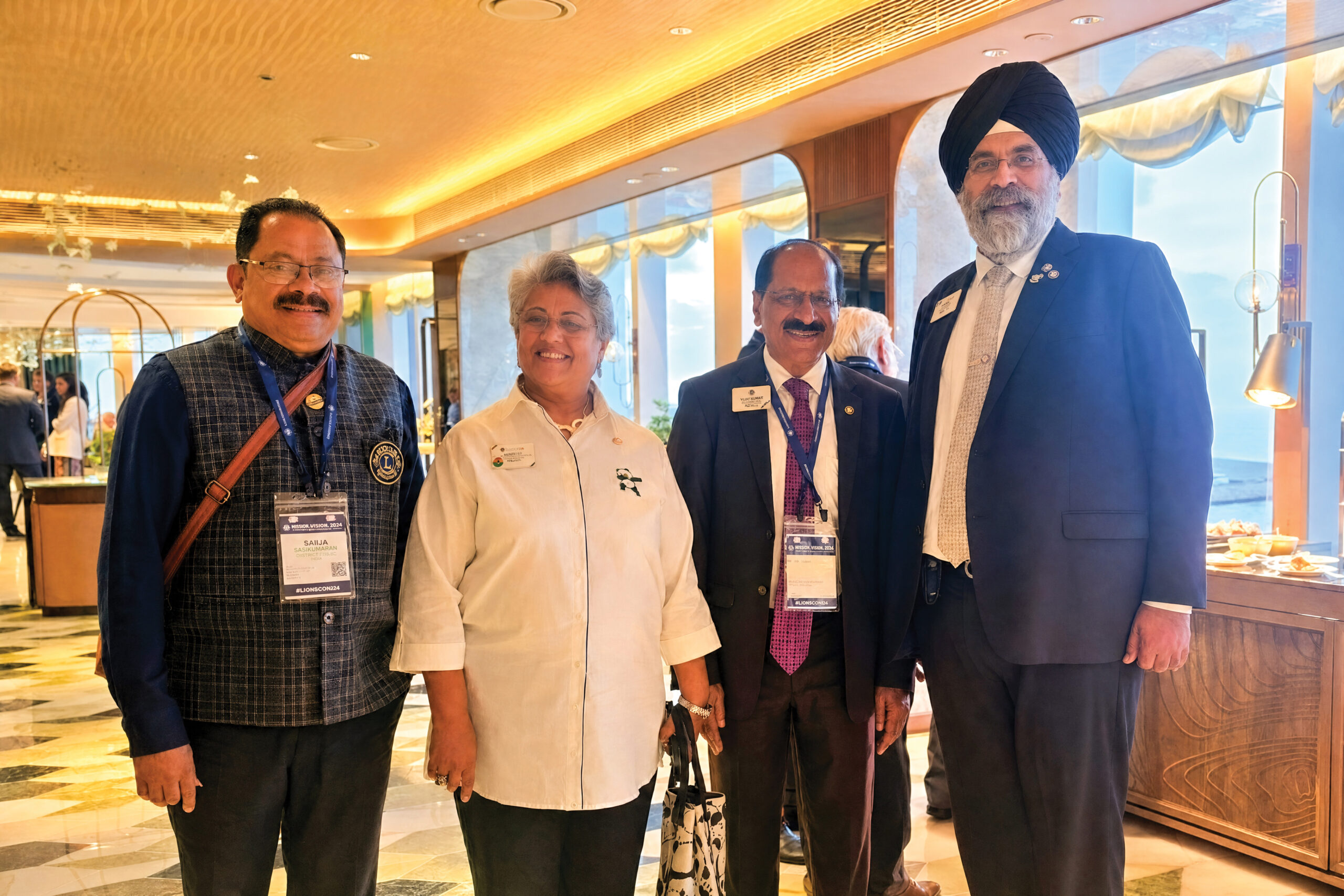V.P. Nandakumar pictured alongside Lion A.P. Singh, International President; Lion Sangeeta Jatia, Board Appointee; and Lion Saju Antony Pathadan, Past Multiple Council Chairperson, Lions International.